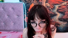 Hot trans sissy demonstrating her dildo blowjob skills